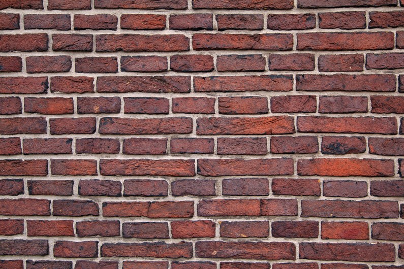 Wall of red bricks 00696